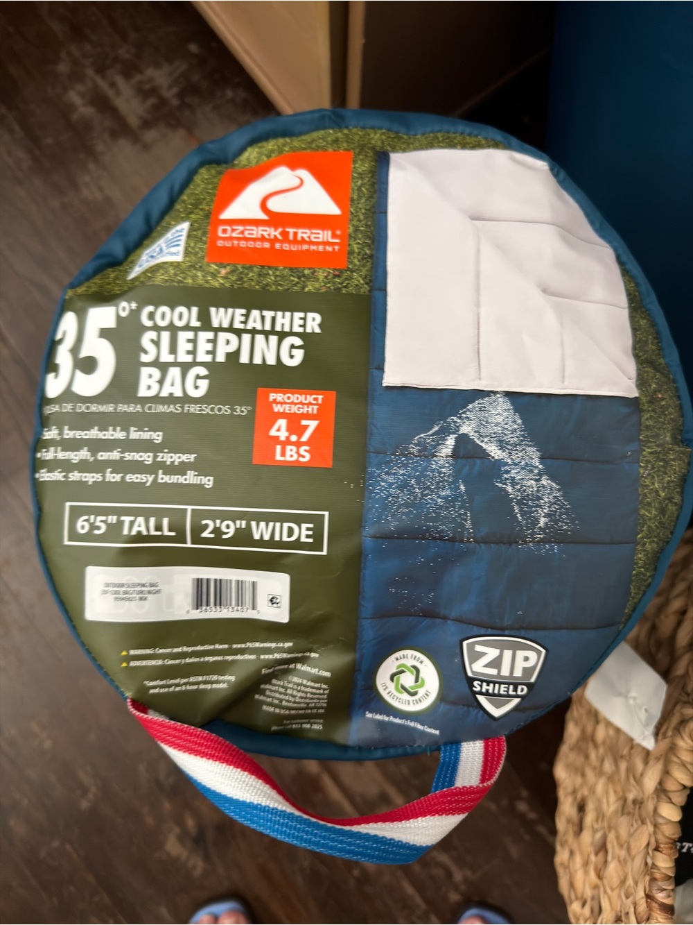 Ozark Trail Blue and White Sleeping Bag with Red, White & Blue Carry Handle
